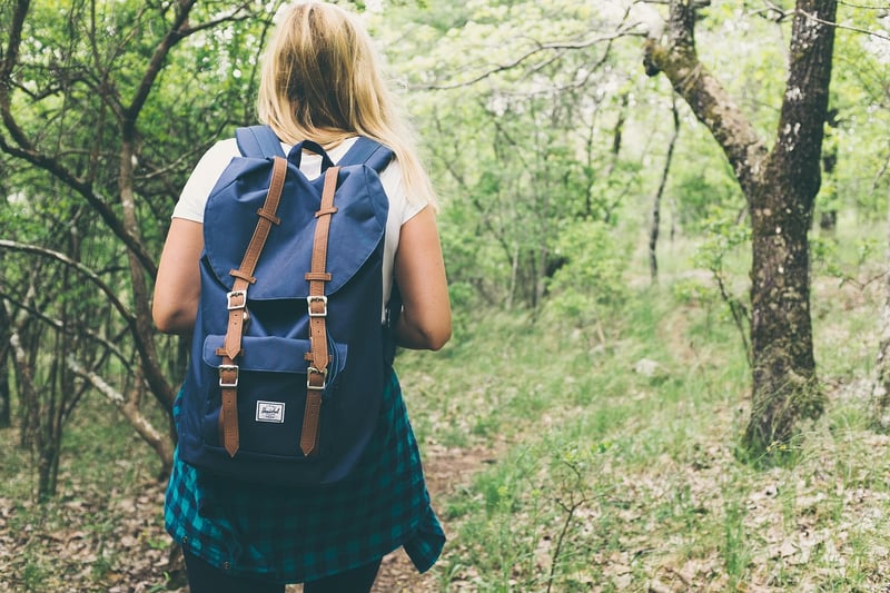 Woman walking in the forest